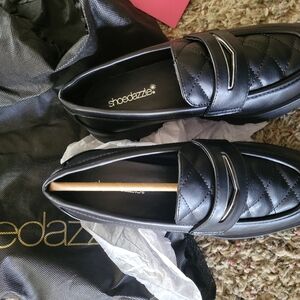 Black loafers
